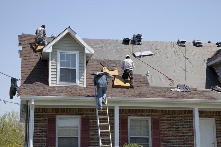 Men fixing Storm Damaged Roofs